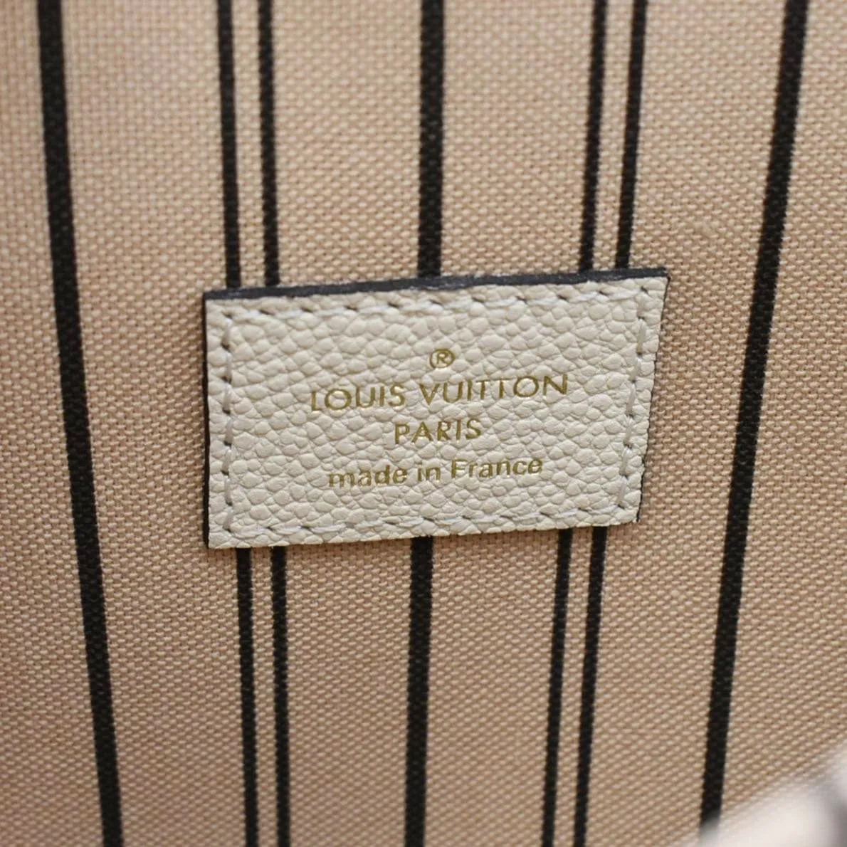 LOUIS VUITTON Metis Pochette Empreinte Leather Crossbody Bag Light Pink
